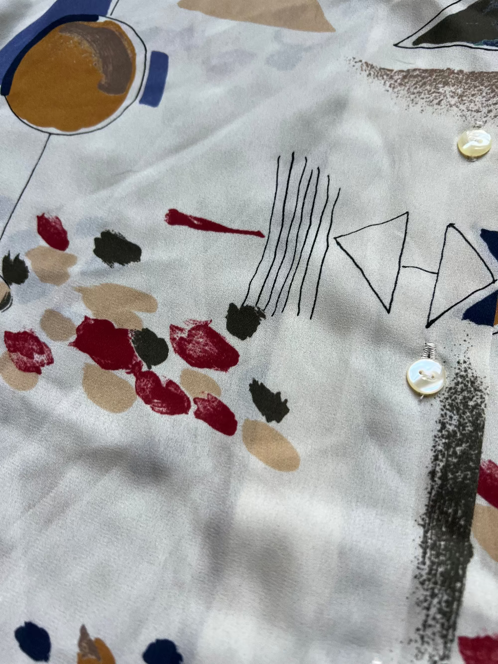 90s muted earth tone geometric button up